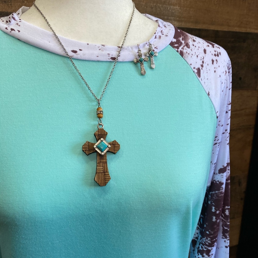 New Teal 3/4 sleeve With brown cow print sleeves